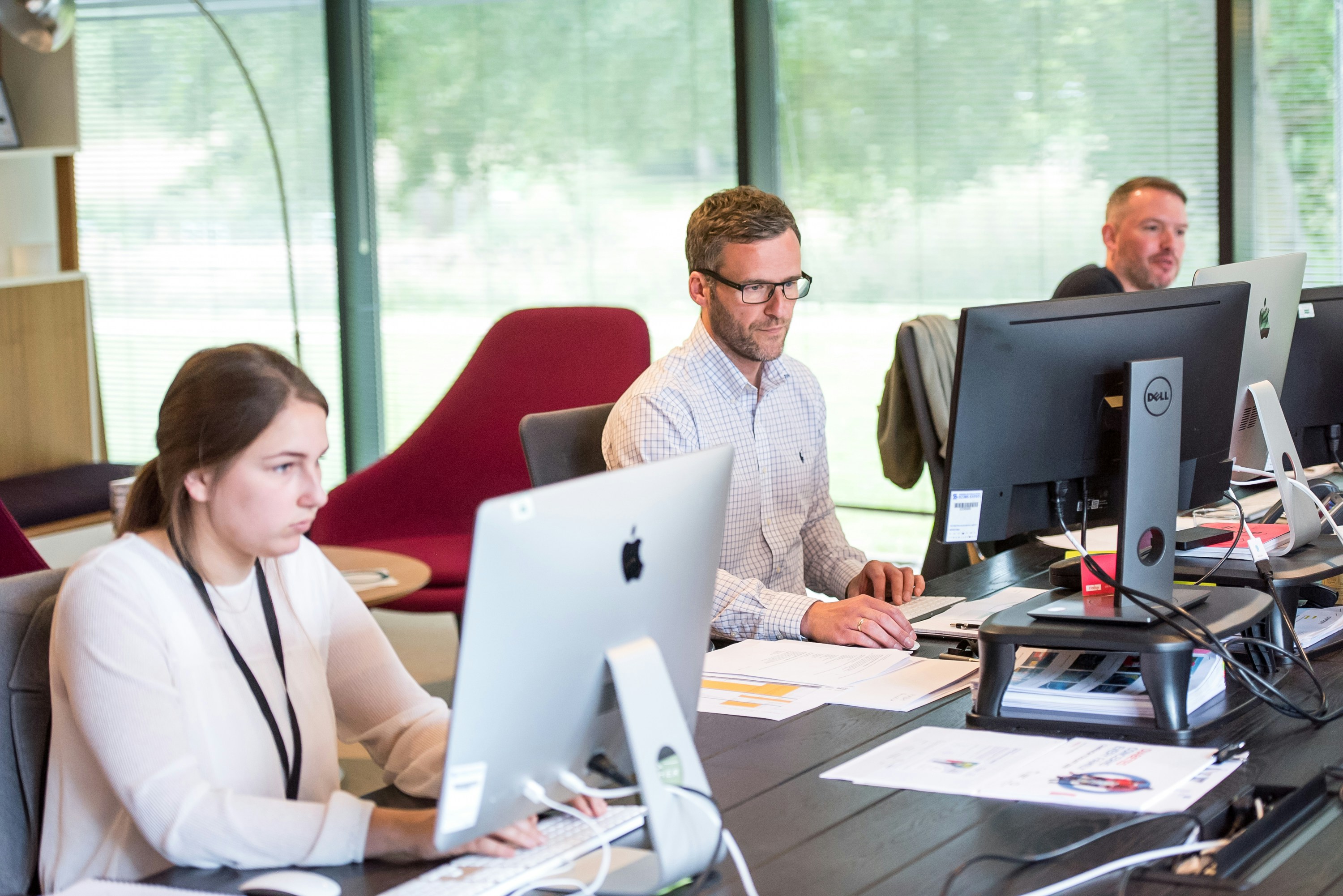 Marketing team collaborating on a customer-centric strategy