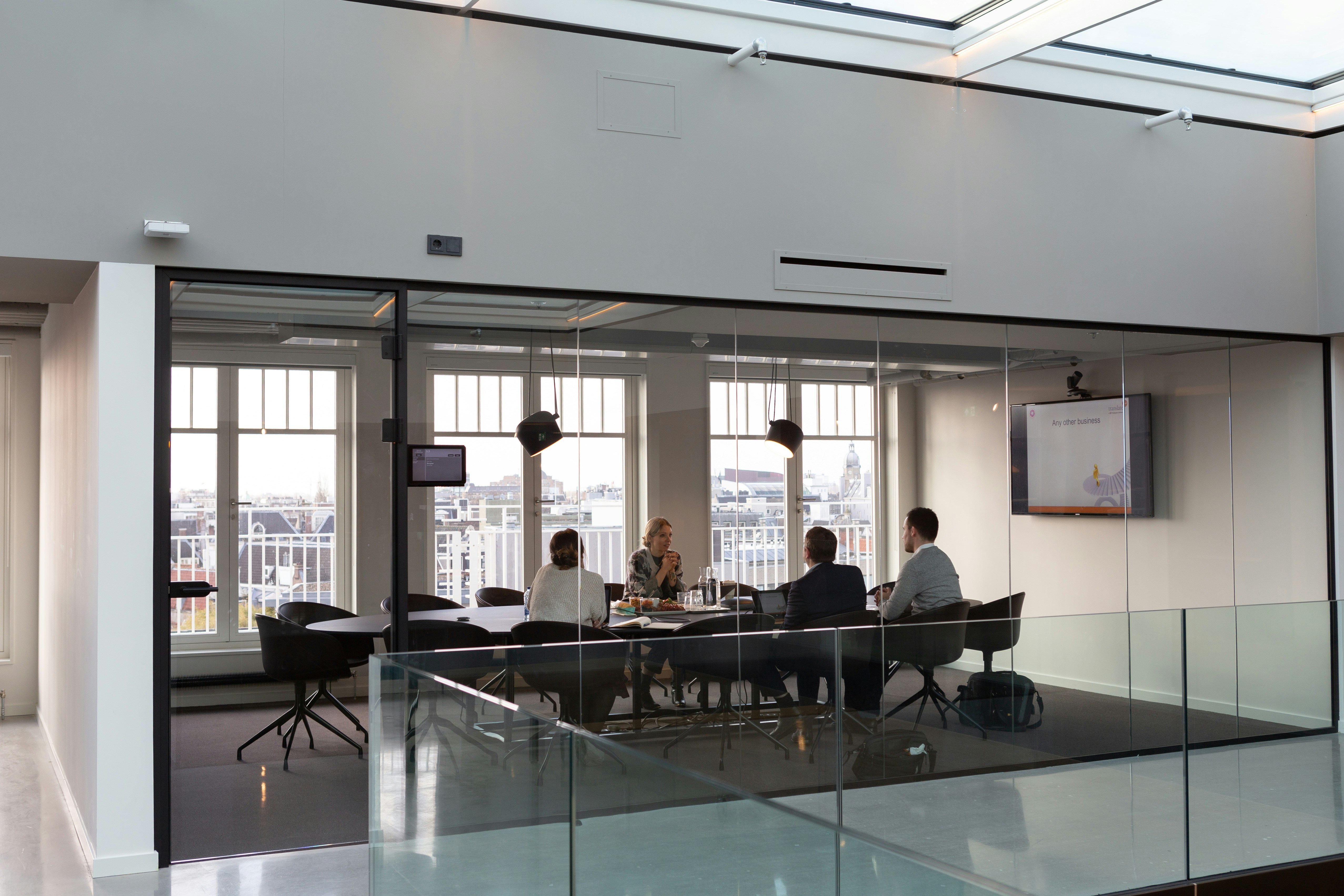 Team of technology professionals collaborating in a modern office
