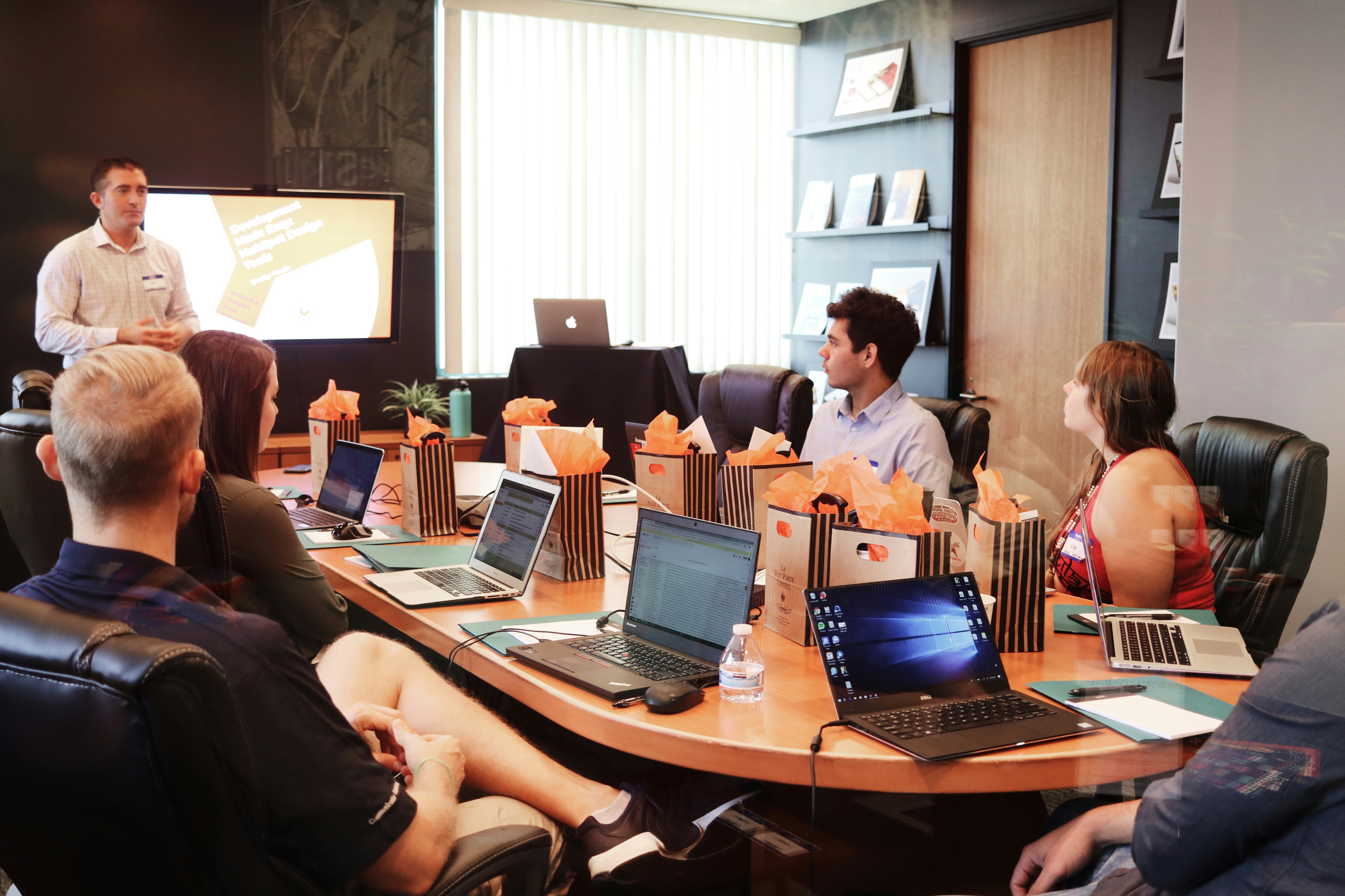 Business professionals collaborating on a growth strategy in an office.