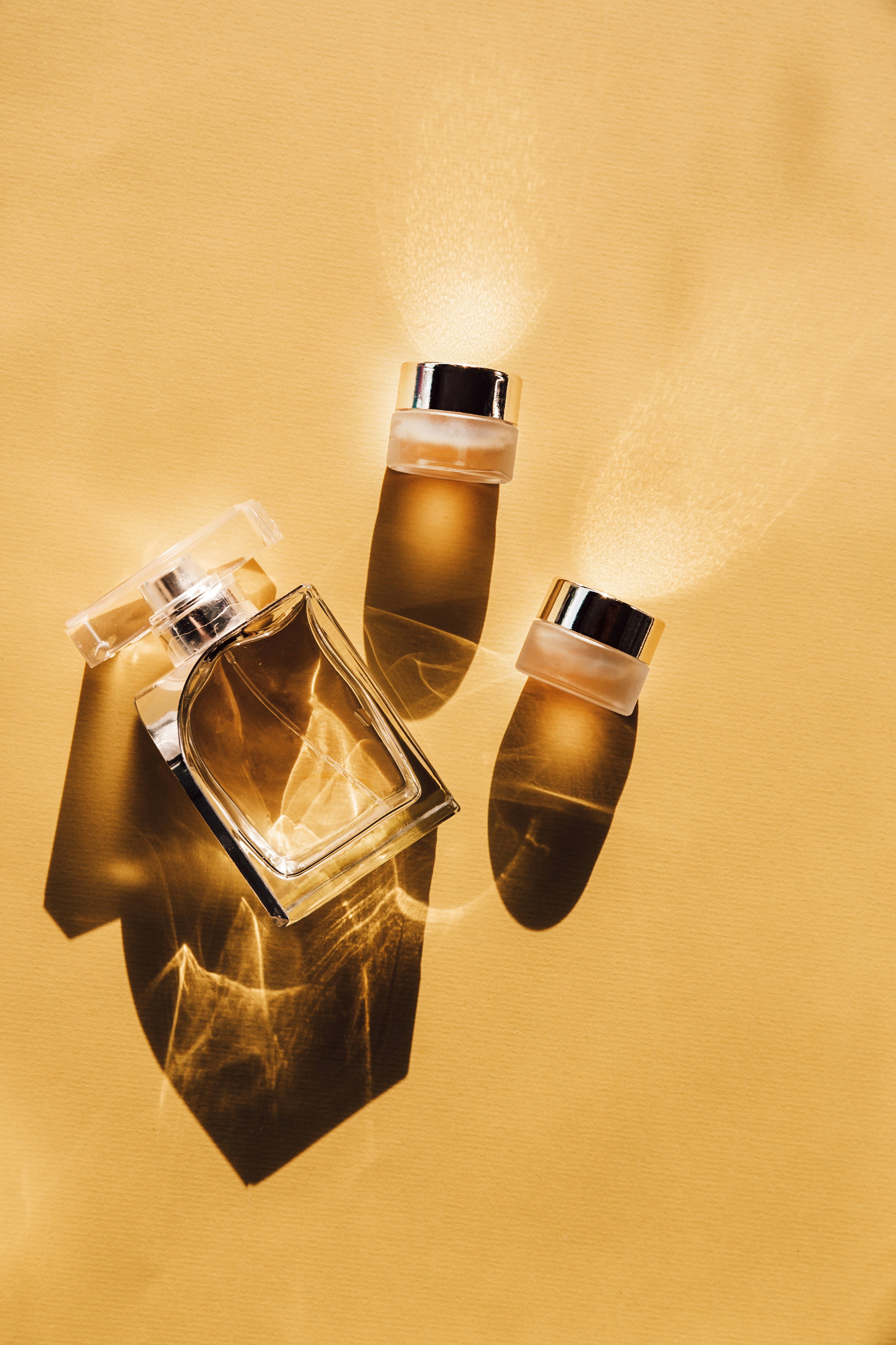 A stylish set of fragrance sample bottles arranged for testing.