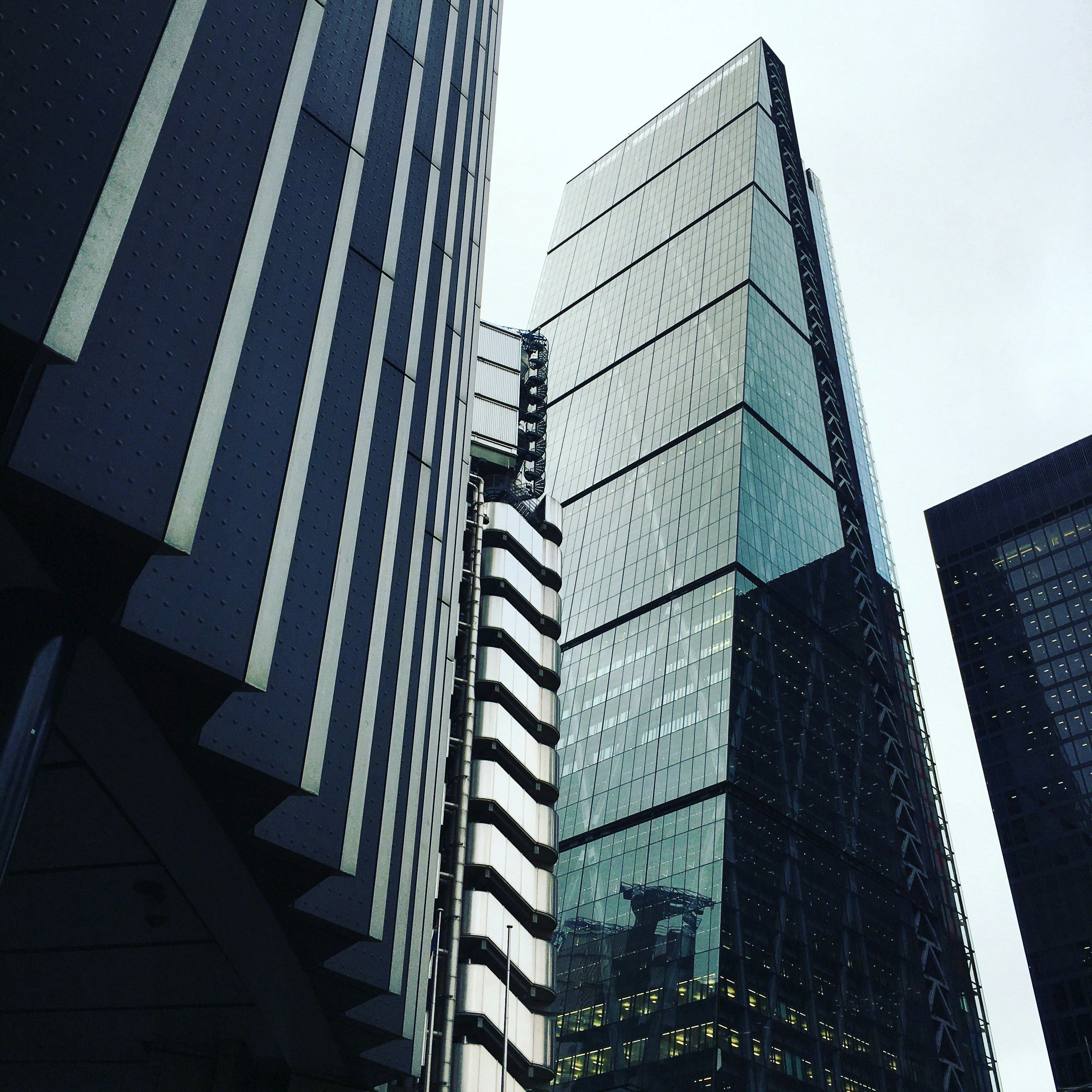 City skyline with a focus on residential and commercial buildings, representing the broader property market.